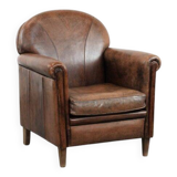 Beautiful vintage sheep leather armchair with a characterful appearance