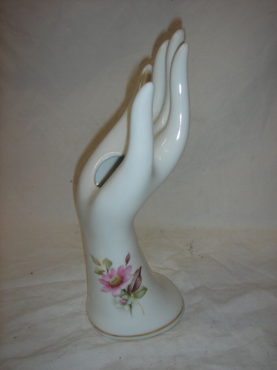 White hand ceramic soliflore with decorations