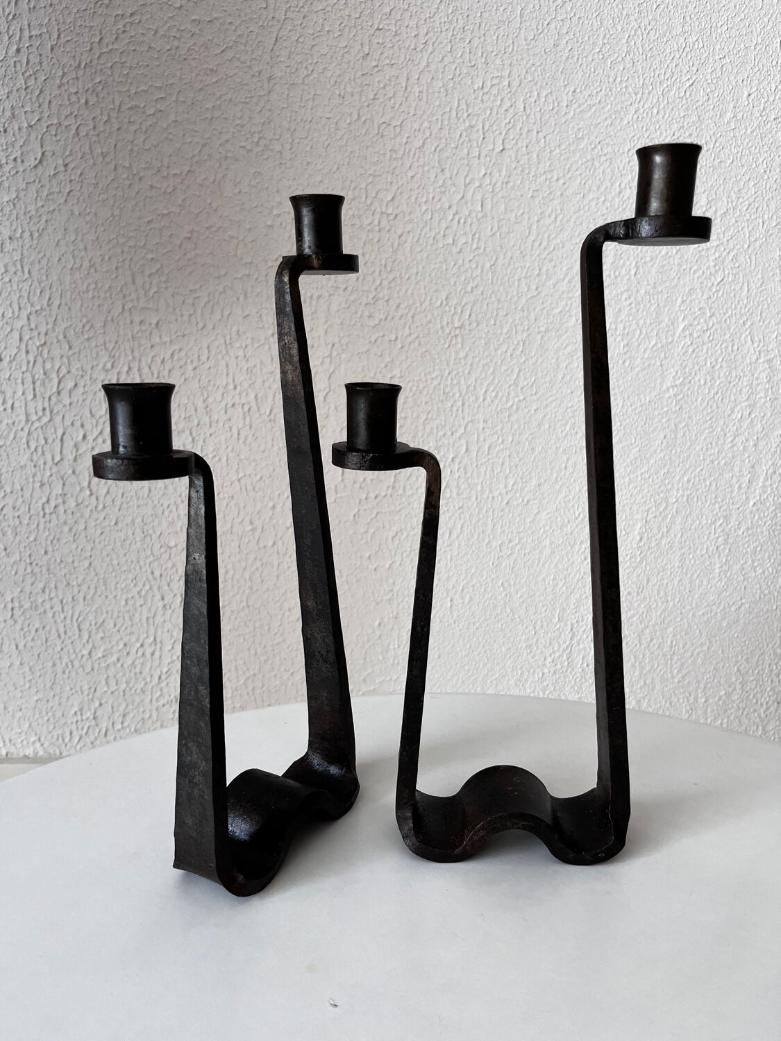 Brutalist wrought iron candlestick pair