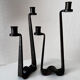 Brutalist wrought iron candlestick pair