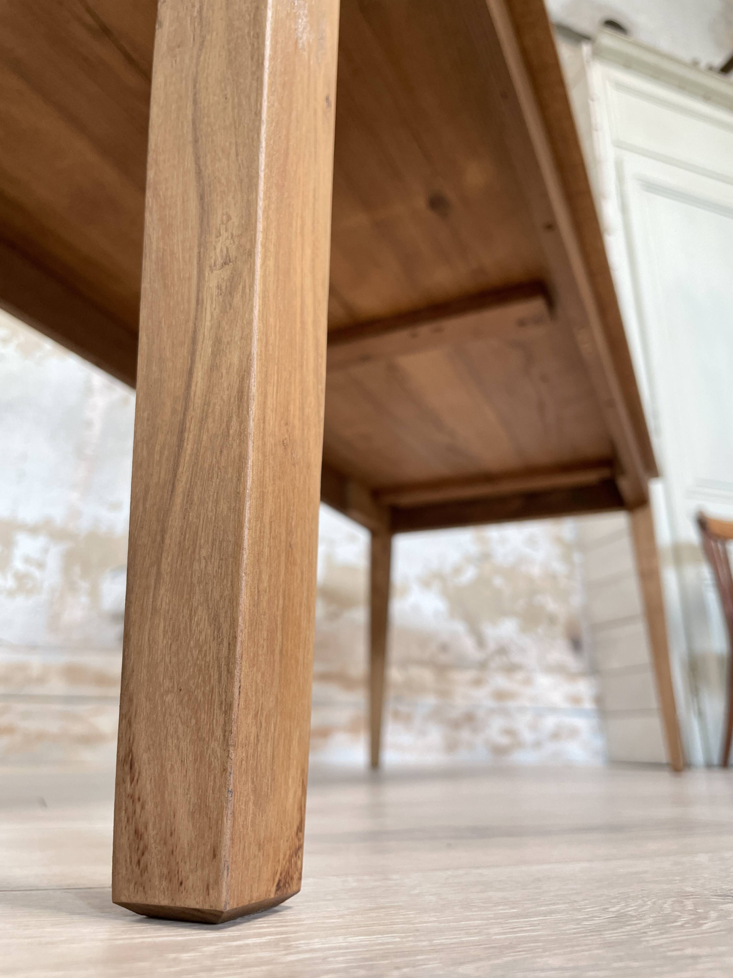 Vintage farm table with spindle legs.