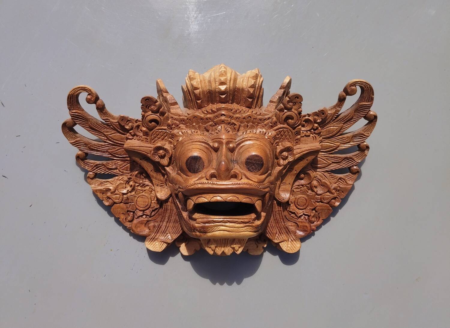 Balinese mask carved from solid wood – Barong spirit