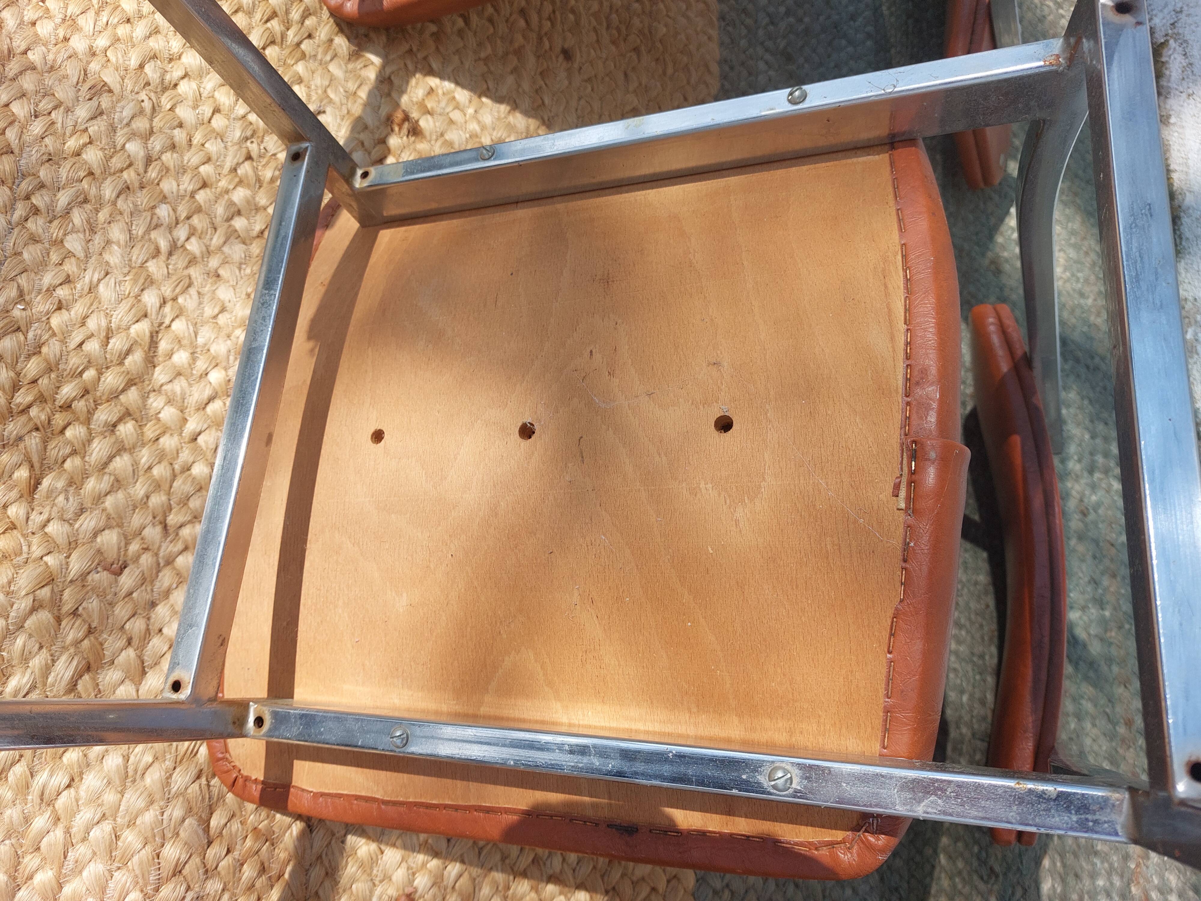 3 stainless steel tube chairs and faux leather, vintage