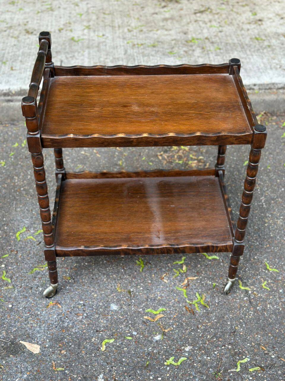 Vintage rolling bar side table in chic rustic style from the 1950s.