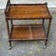 Vintage rolling bar side table in chic rustic style from the 1950s.