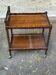Vintage rolling bar side table in chic rustic style from the 1950s.