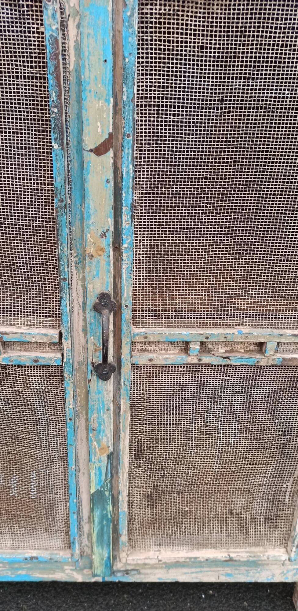 Small pantry buffet in old wood with mesh doors