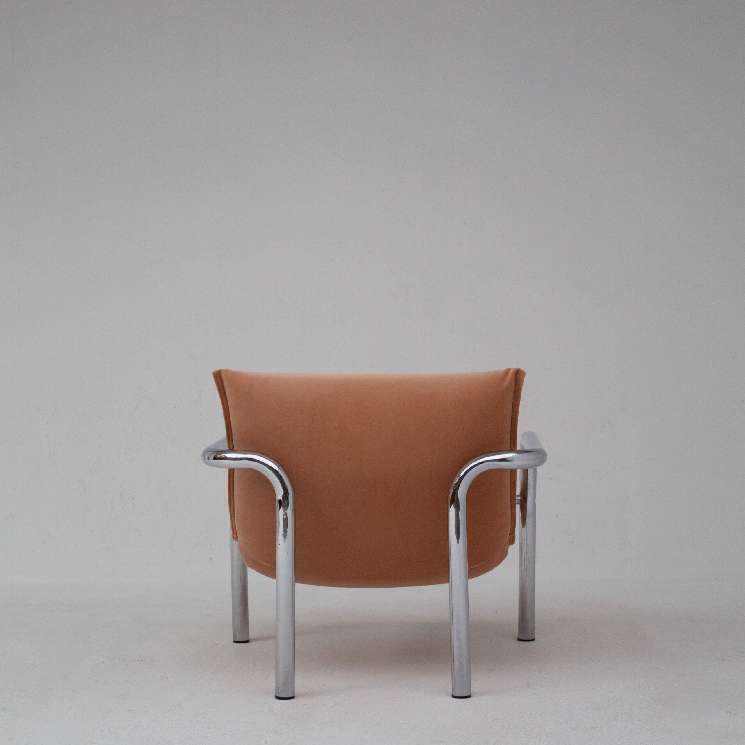 Pair of tubular armchairs in salmon velvet