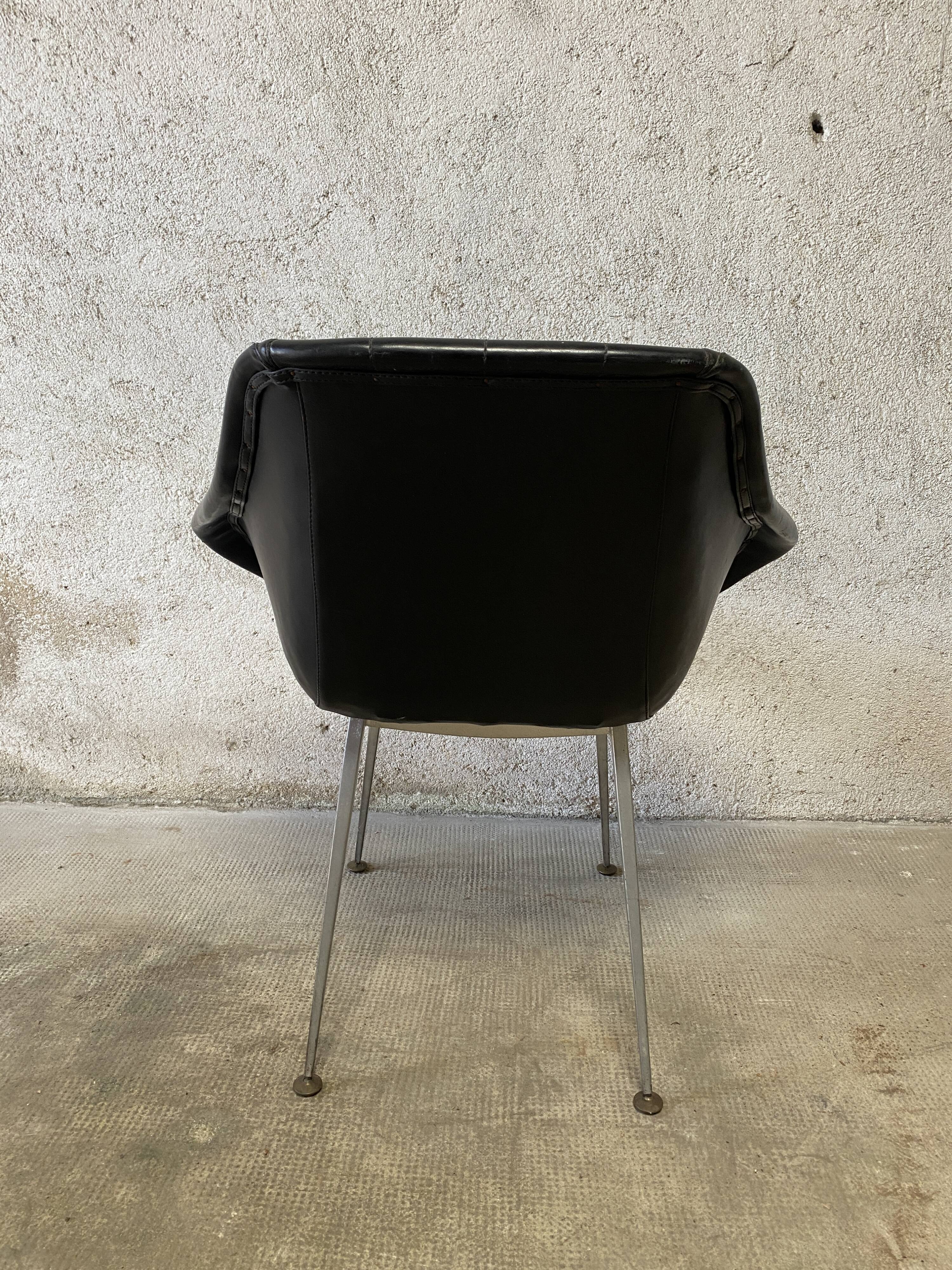 Pair of upholstered armchair year 60