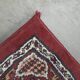 Beautiful rug/carpet with mainly red colours and nice patterns 230x170cm