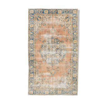 Orange & blue vintage area rug