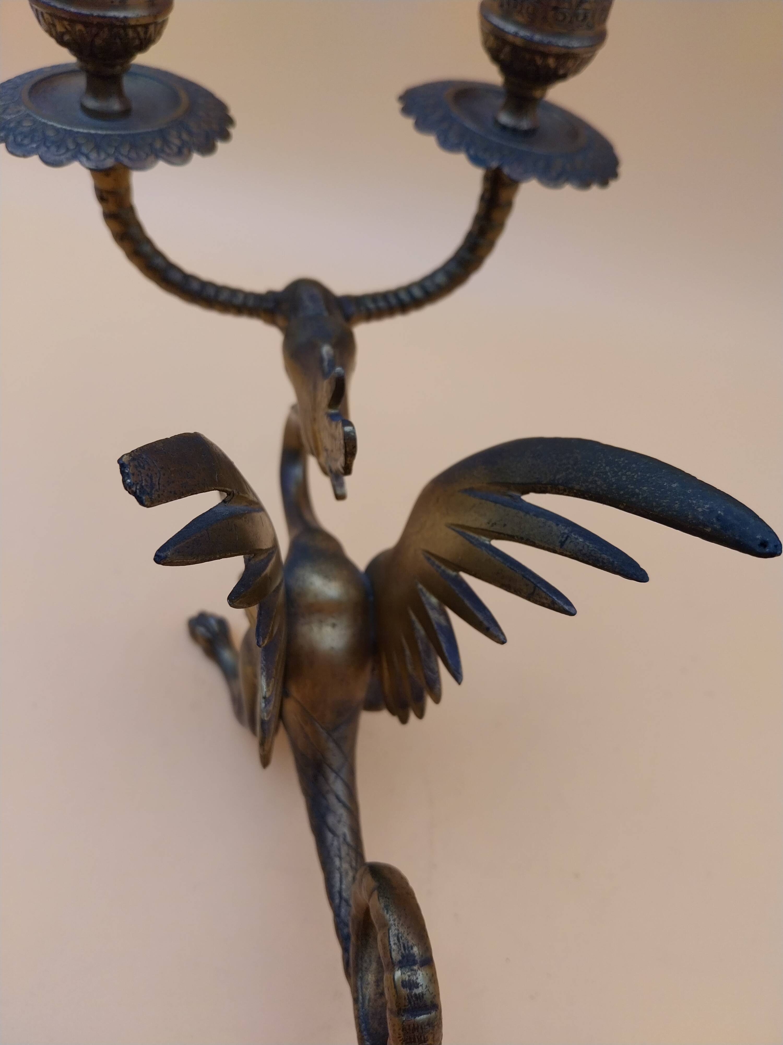 Pair of bronze candlesticks with chimera dragons