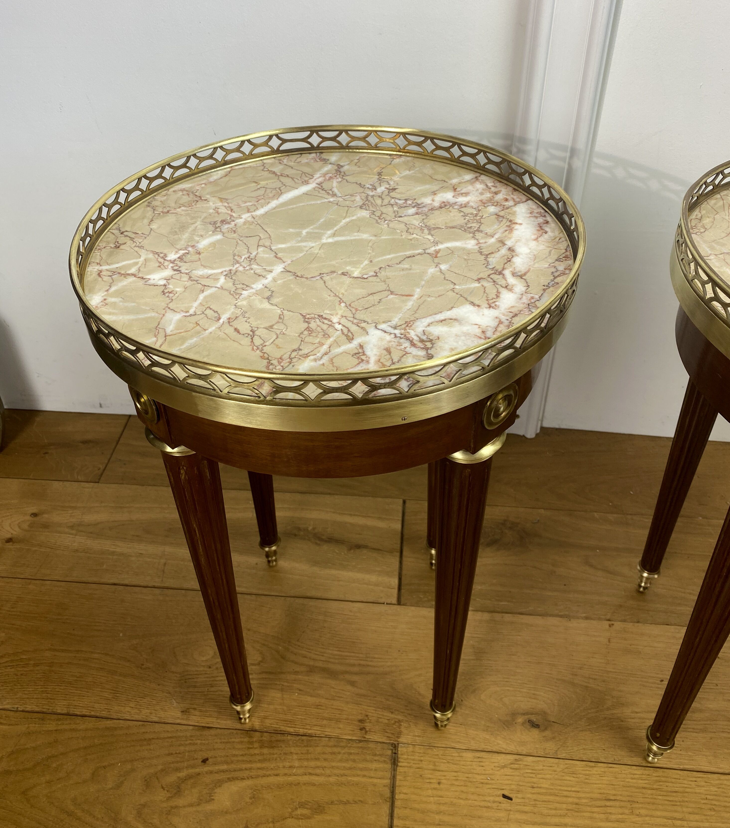 Pair of old pedestals stamped " h.j.l.rossenu " in mahogany over marble