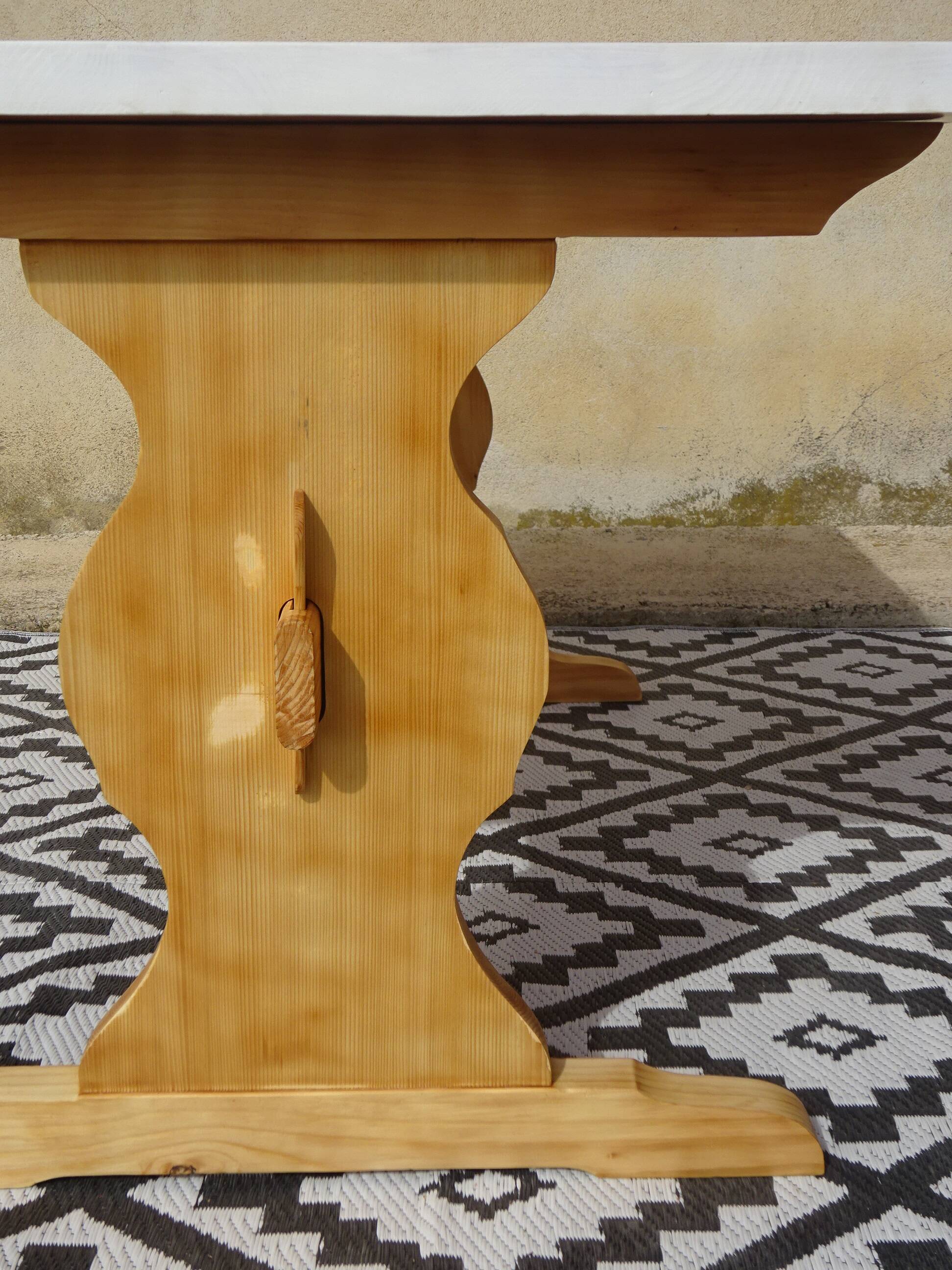 Table made entirely of solid pine, white top.