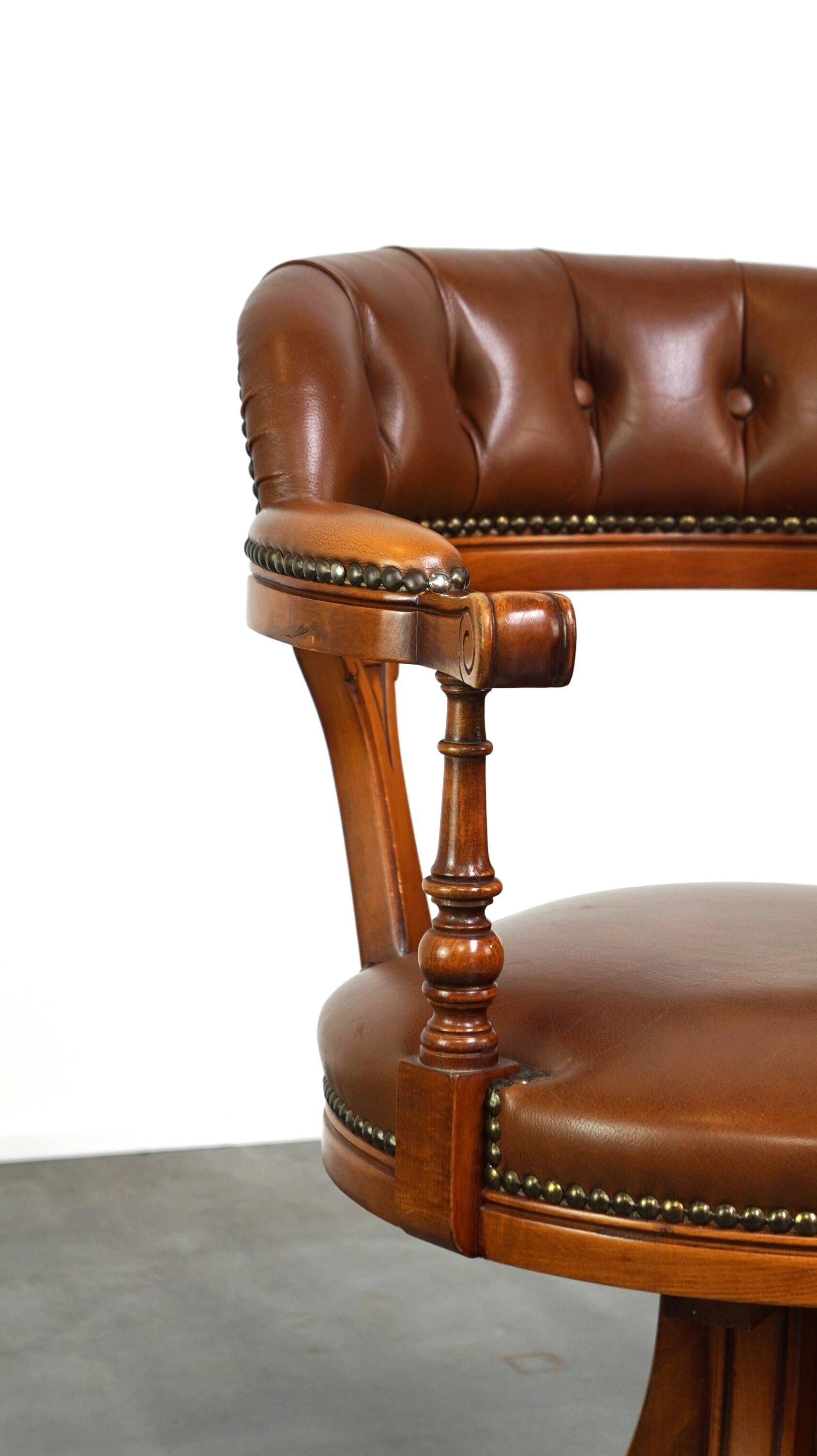 Swivel English style Chesterfield armchair/office chair in brown cowhide
