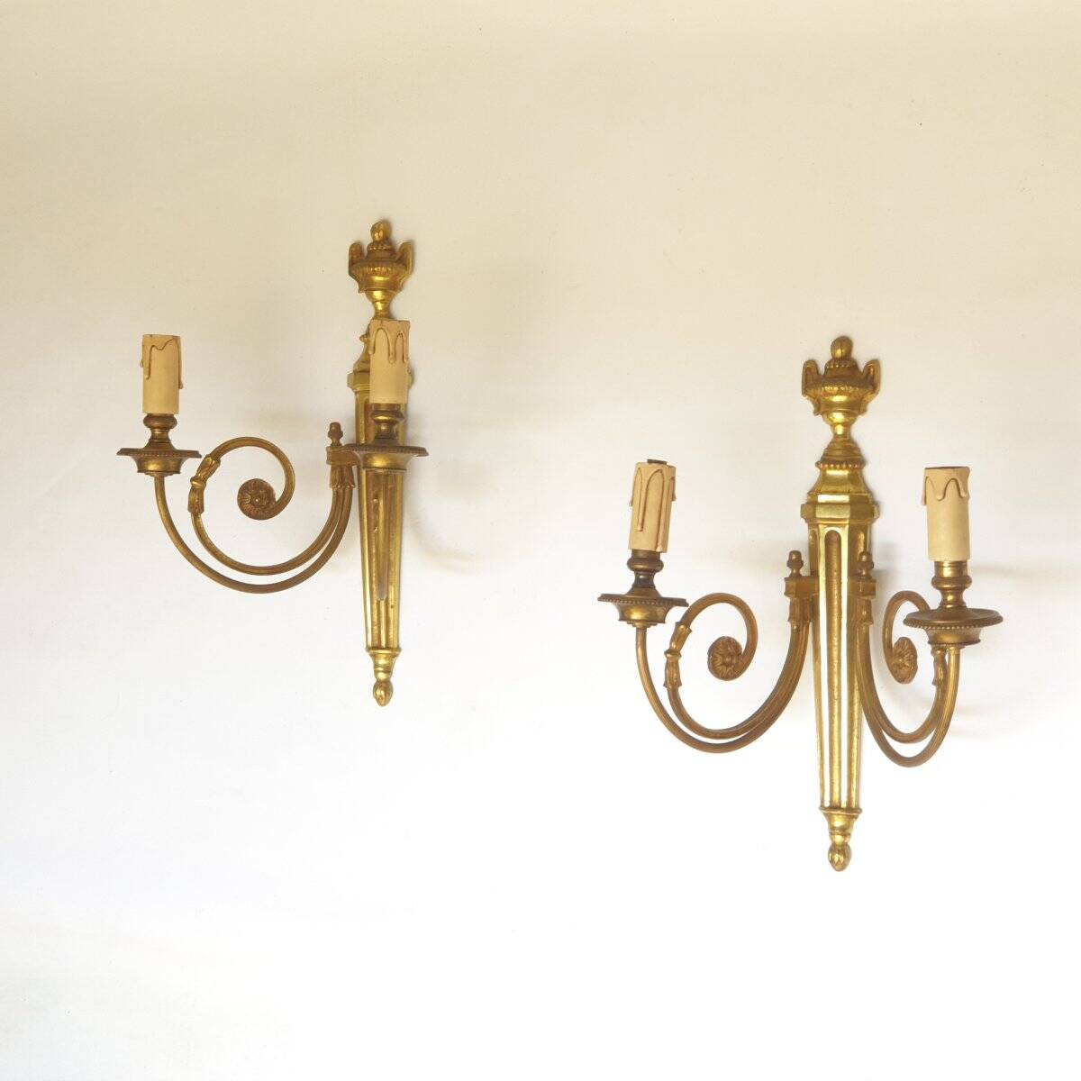 Pair of bronze wall sconces in Louis XVI style