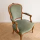 Pair of cabriolet armchairs in Louis XV style in green velvet.