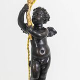 Lampe en bronze représentant un putti, socle en marbre. Circa 1880.