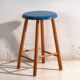 Antique wooden stool with a round seat – Central Europe, around 1950