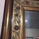 Golden polychrome mirror