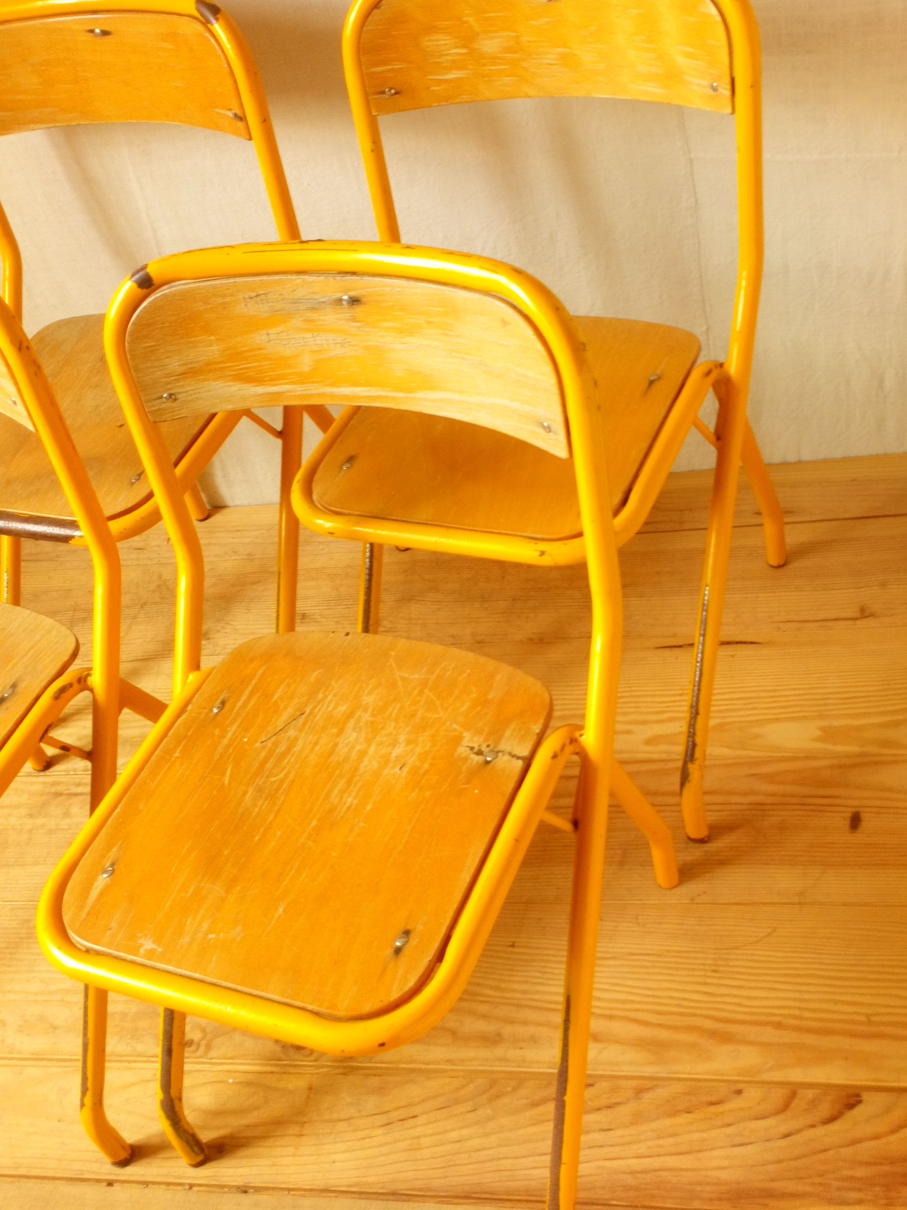 Four school chairs
