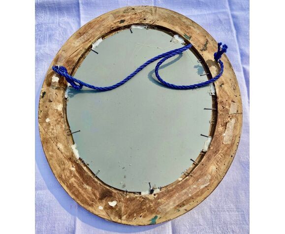 Oval wall mirror in gilded wood late nineteenth