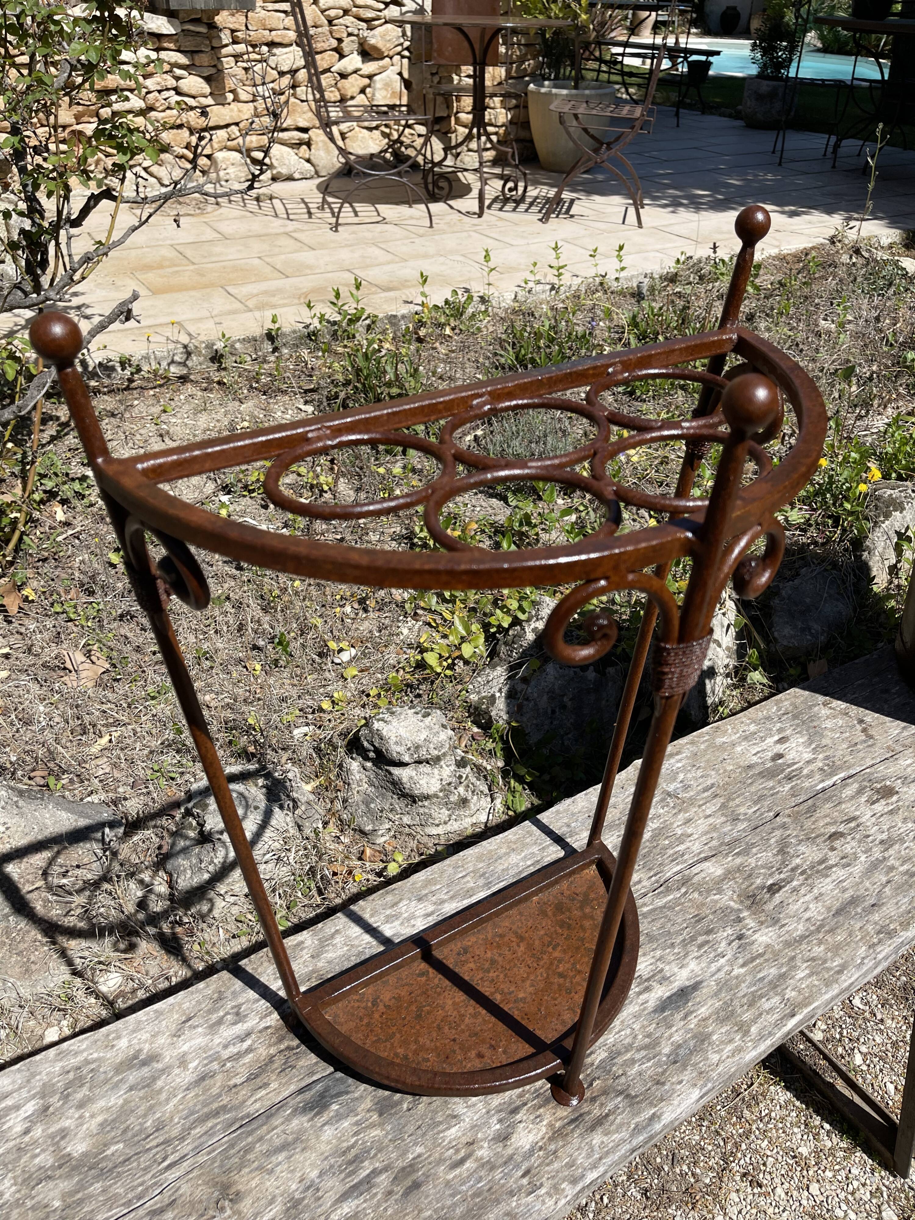 Wrought iron umbrella holder