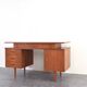 Bureau en teck des années 1960.