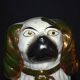 Pair of earthenware dogs (cavalier king charles)