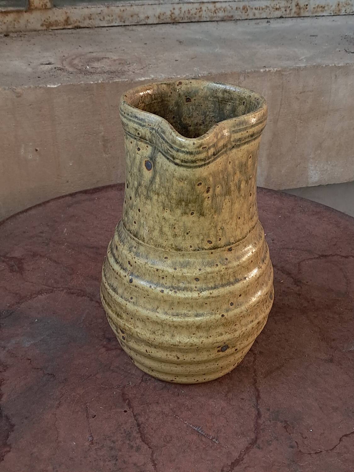 Glazed stoneware pitcher