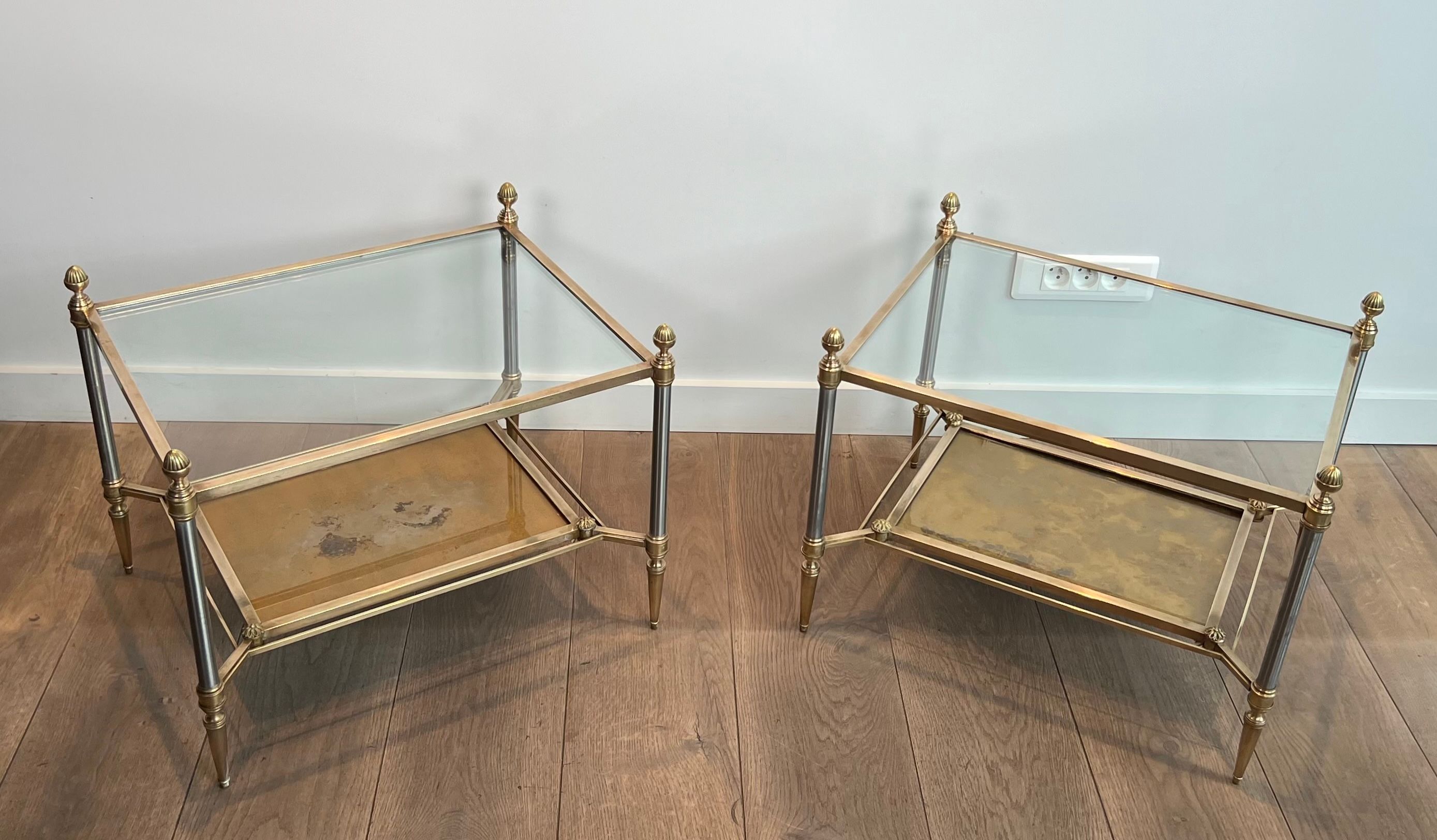 Pair of neoclassical side tables in steel and brass by Maison Jansen.
