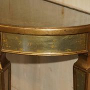 Half-moon console Eglomise Theodore Alexander with a gold finish.
