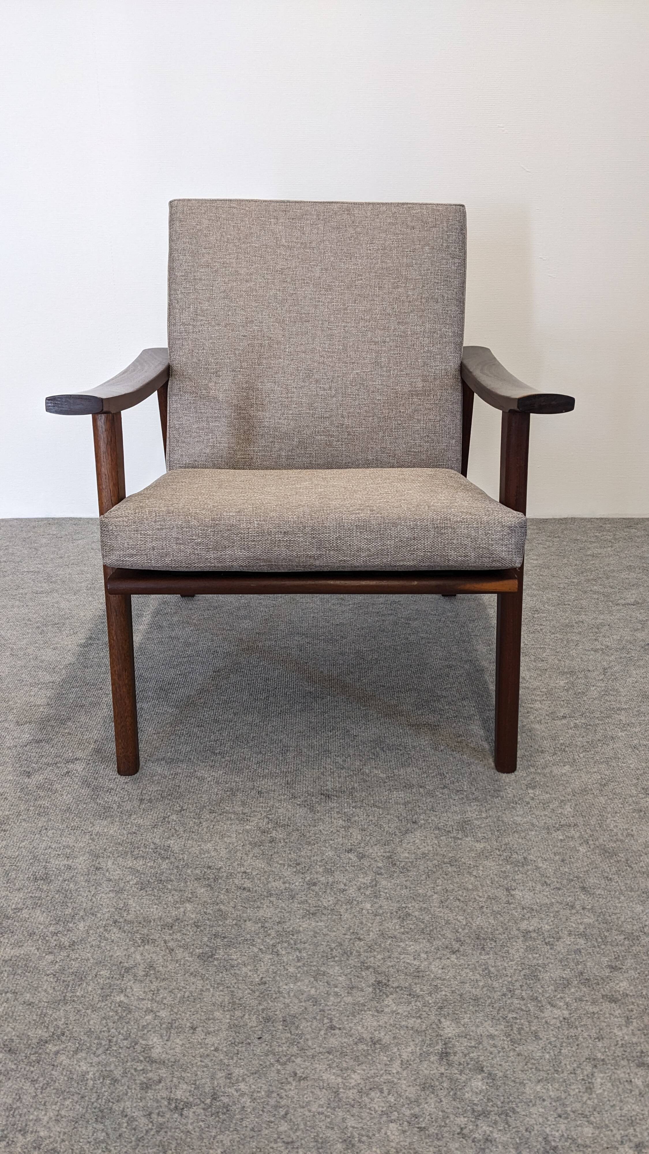 Scandinavian style armchair in teak, Eastern Europe around 1950.