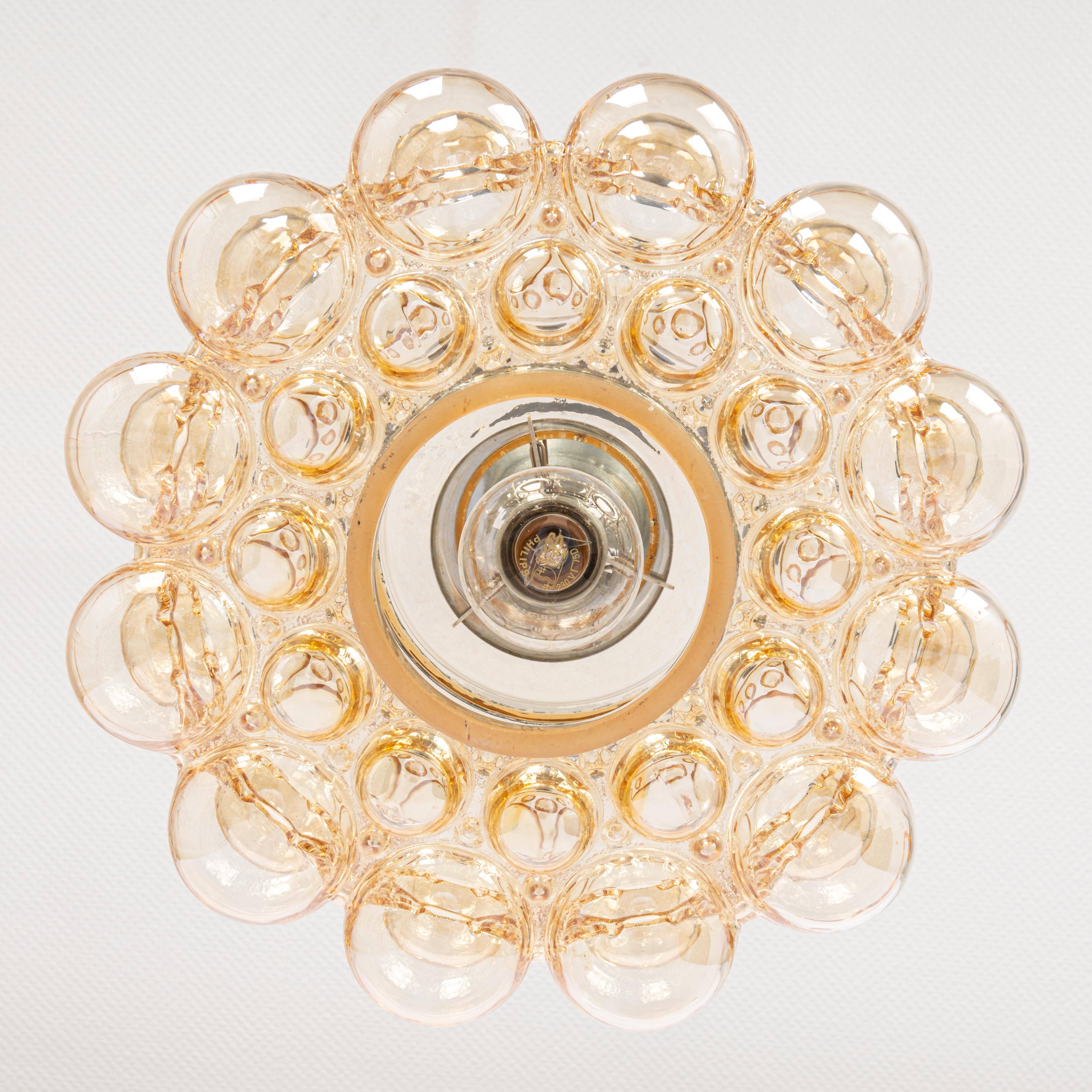 Large amber bubble glass pendant light by Helena Tynell for Limburg, Germany, 1970s.