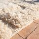 Moroccan handwoven wool rug, 250x150 cm, traditional style.