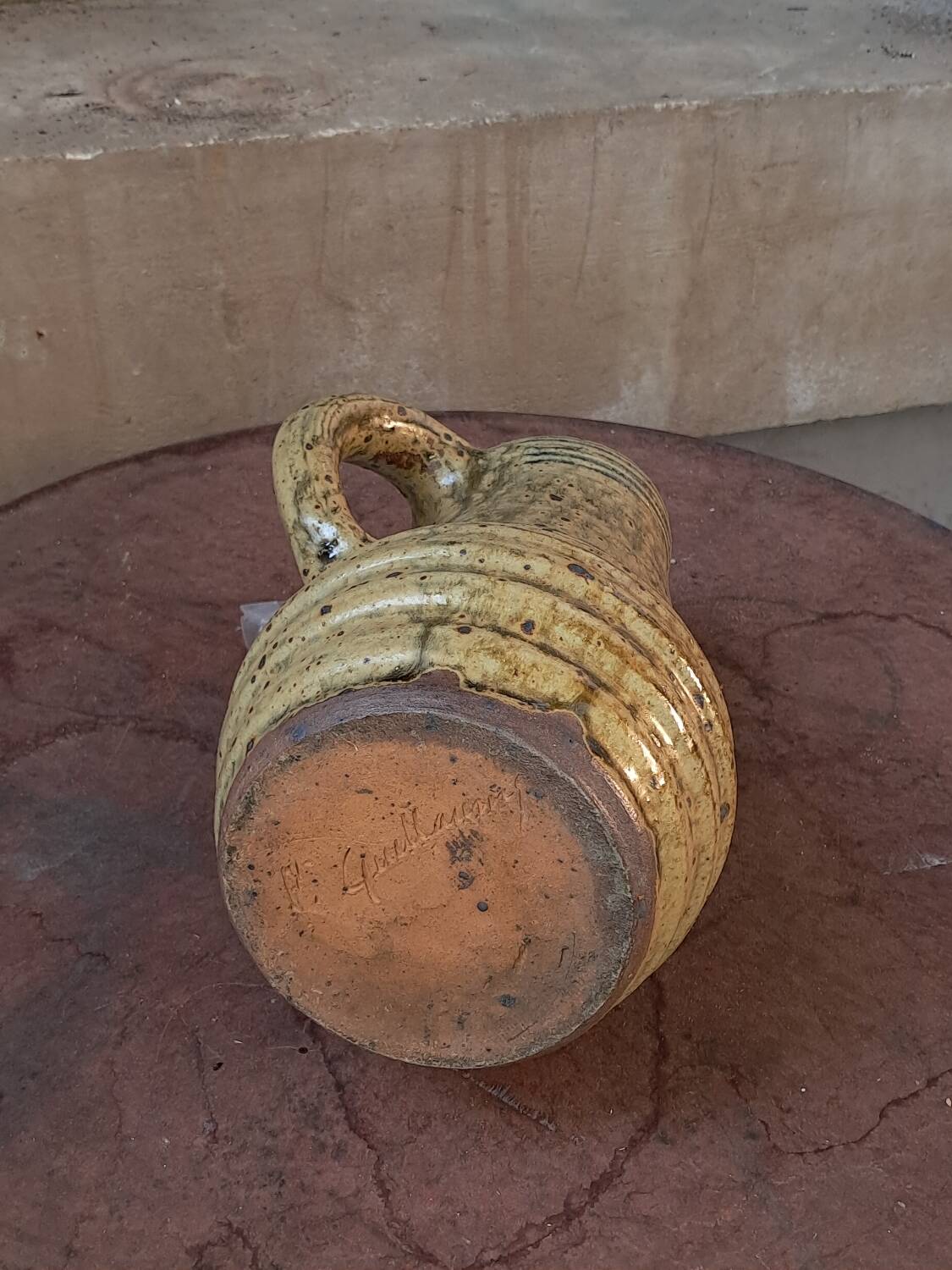 Glazed stoneware pitcher