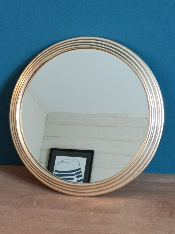 Mirror round surround patinated gilded brass metal