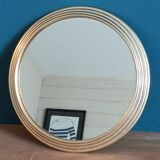 Mirror round surround patinated gilded brass metal