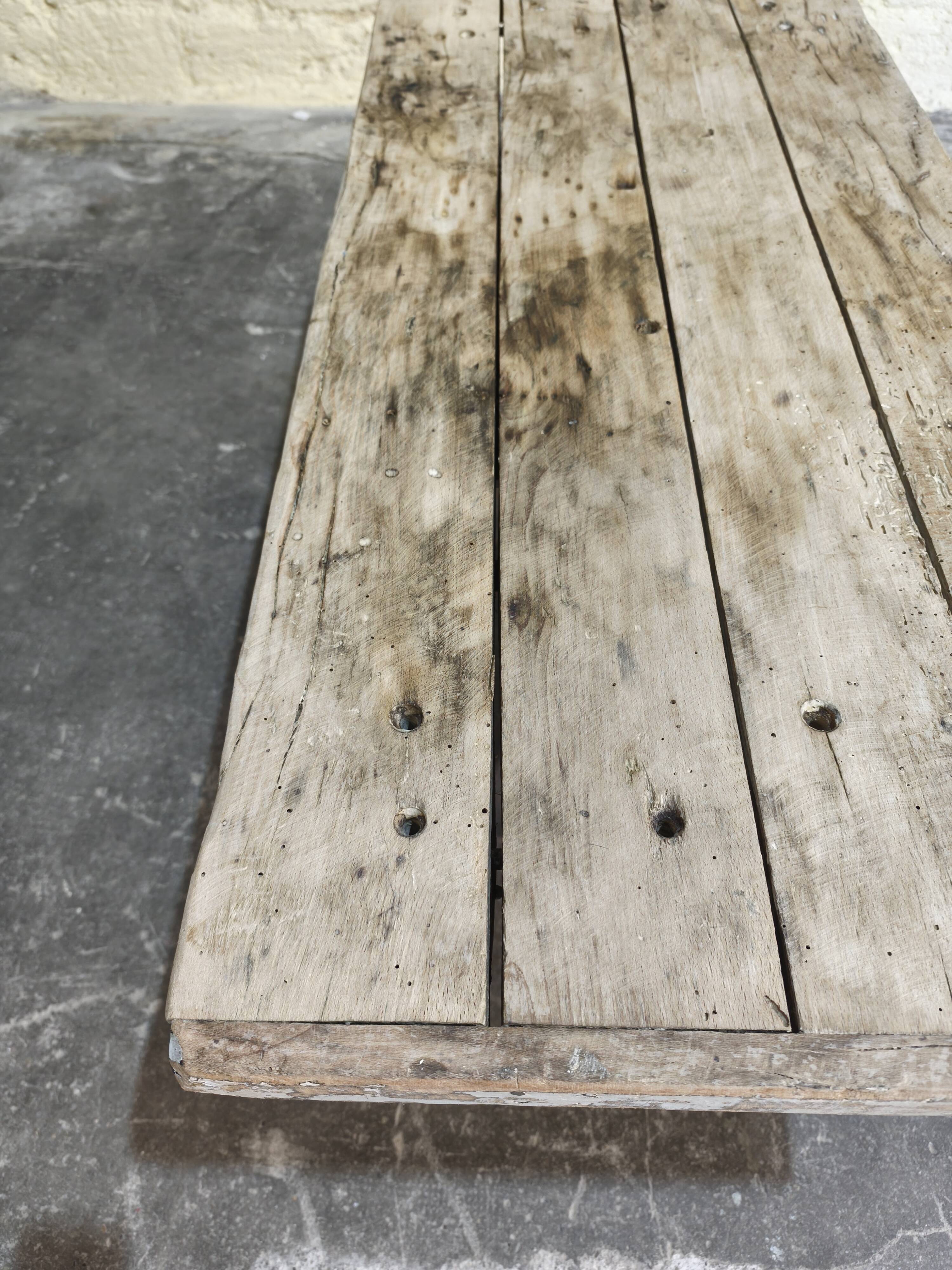 Solid oak coffee table with industrial cast iron legs