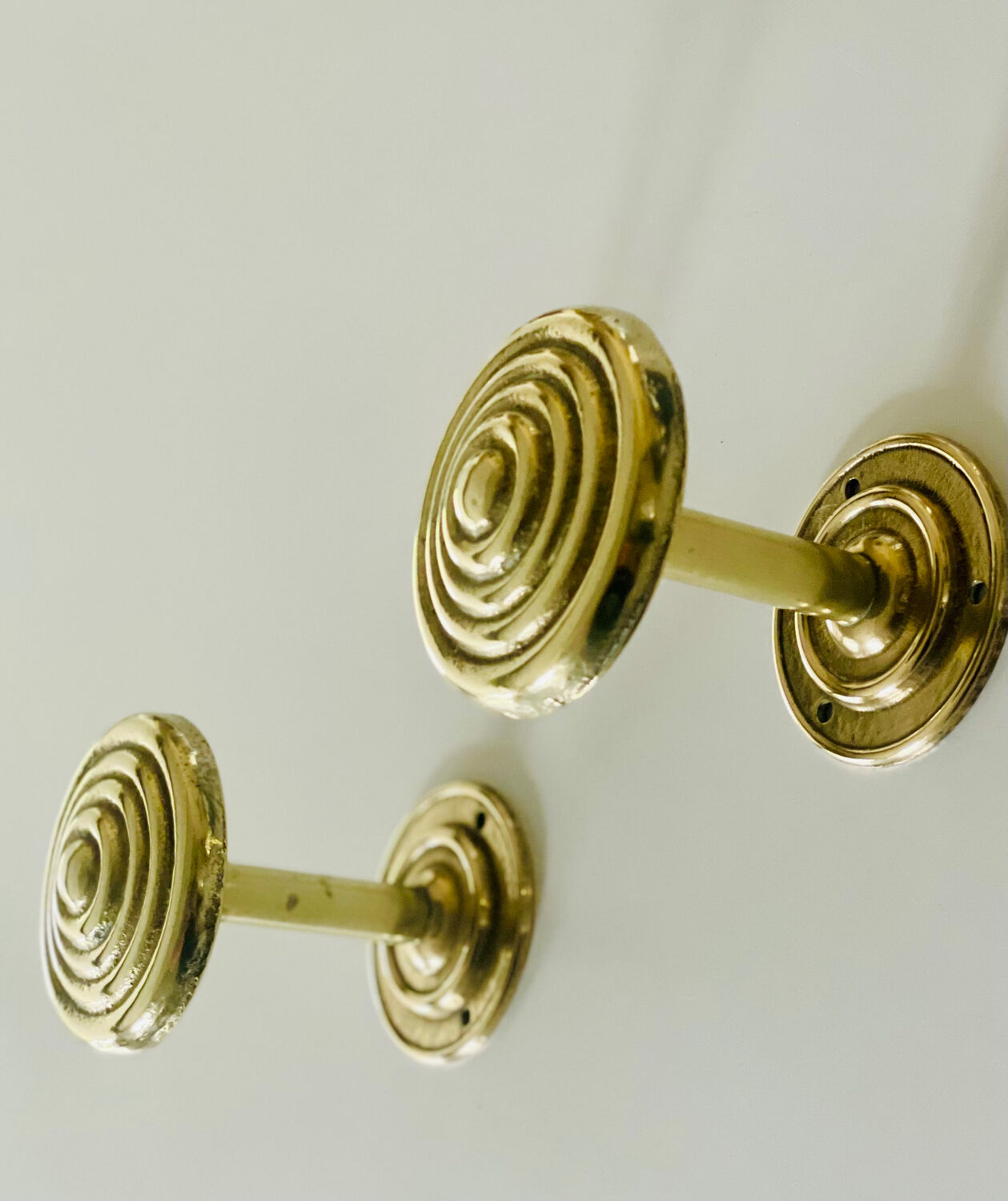 2 gold metal curtain tieback hooks