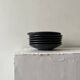 Handmade round ceramic bowls made of Japanese stoneware.