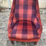 Set of two armchairs and its velvet checkerboard pouf