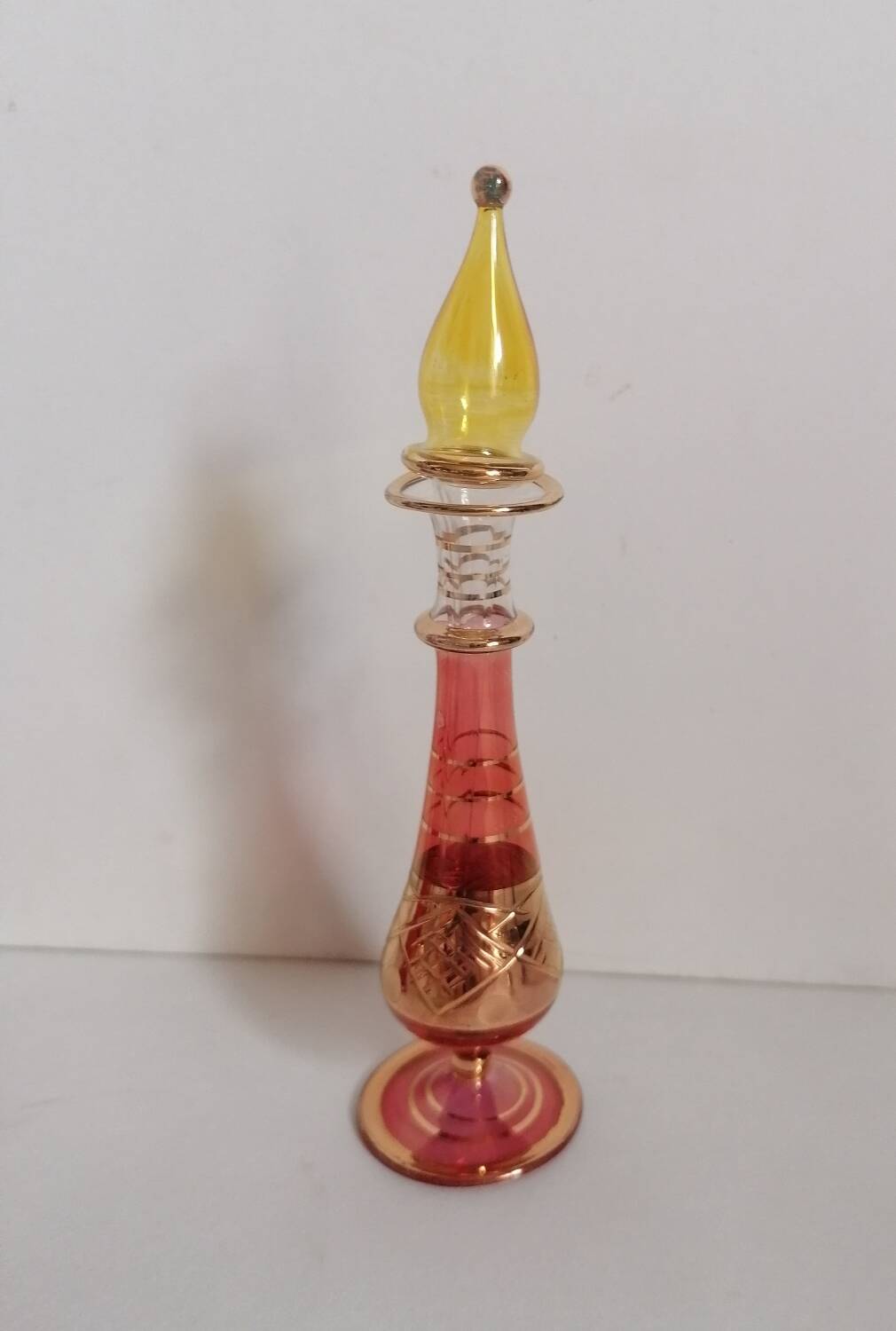 6 Egyptian gold and mouth-blown perfume bottles
