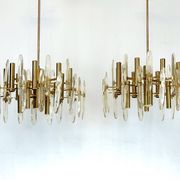 Sciolari, pair of Italian brass and glass chandeliers from 70s