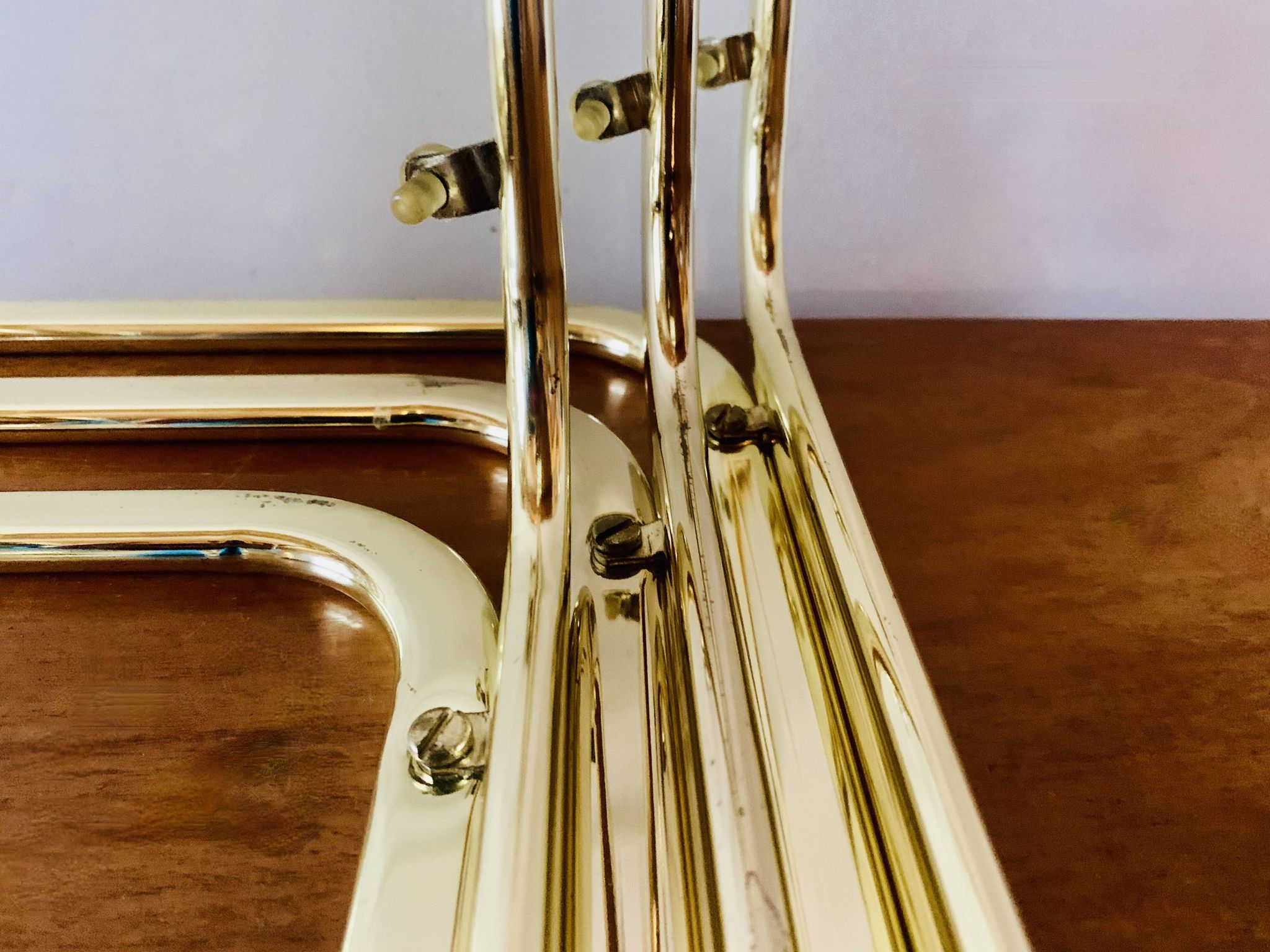 Vintage nesting tables in gold metal and smoked glass
