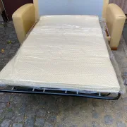 Art Deco 3-seater convertible sofa in genuine beige leather and red fabric from the 1980s.