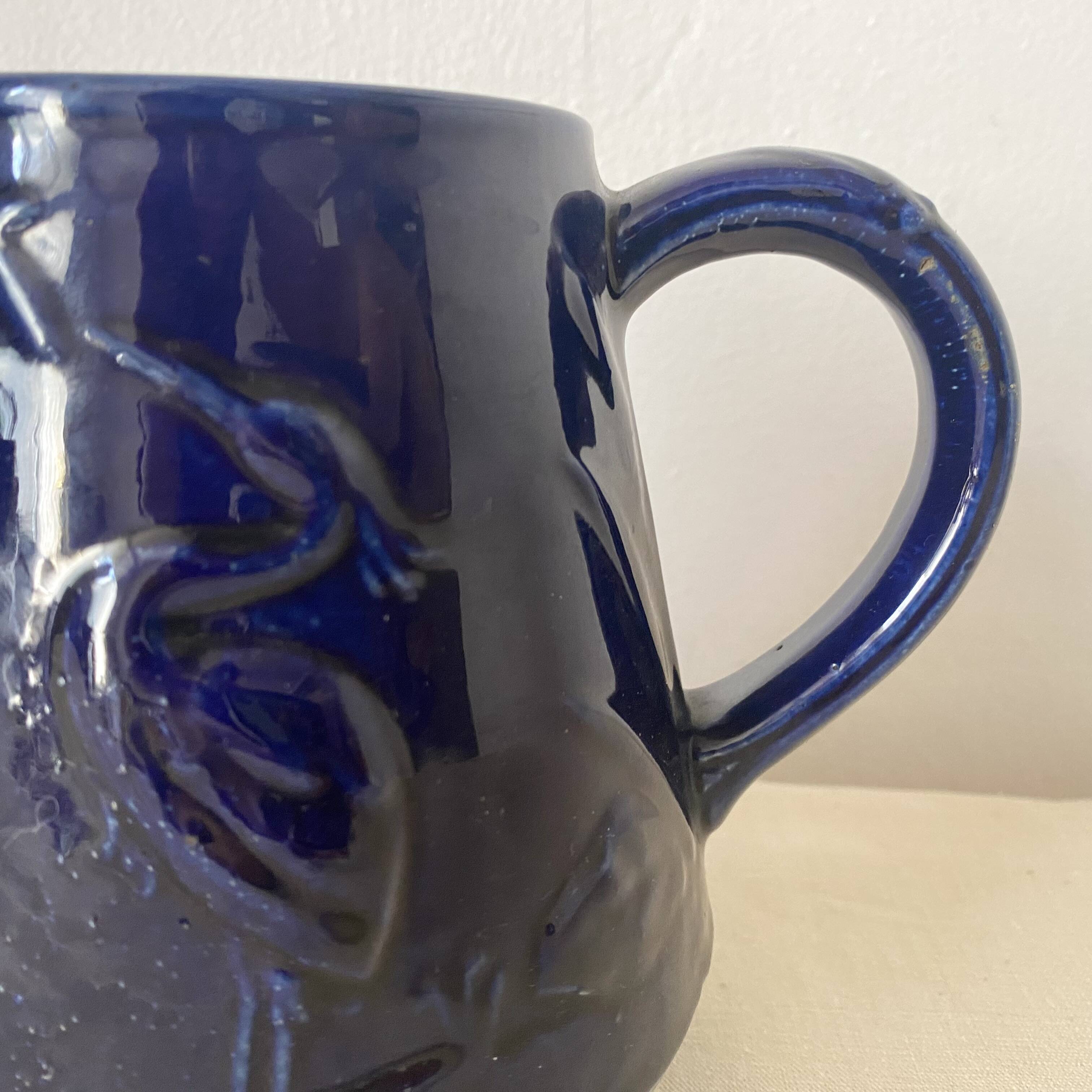 Heron slip jug made in England