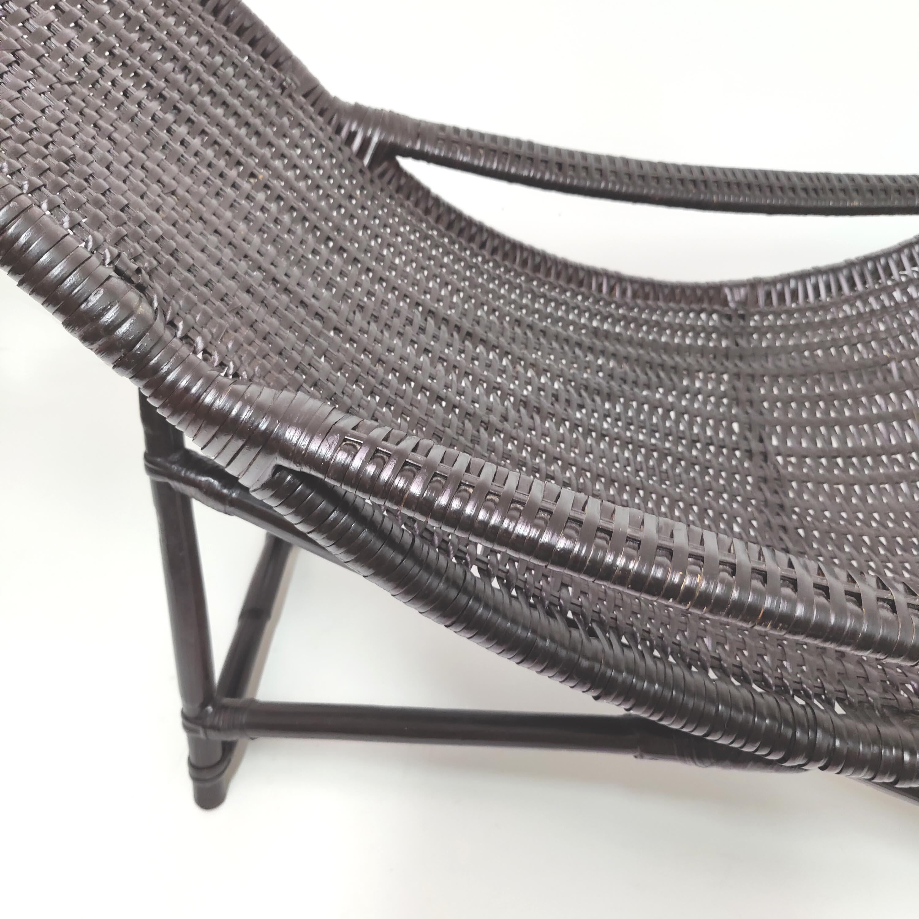 Vintage black rattan deck chair