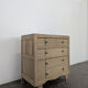 Brutalist commode with stripped diamond tips.
