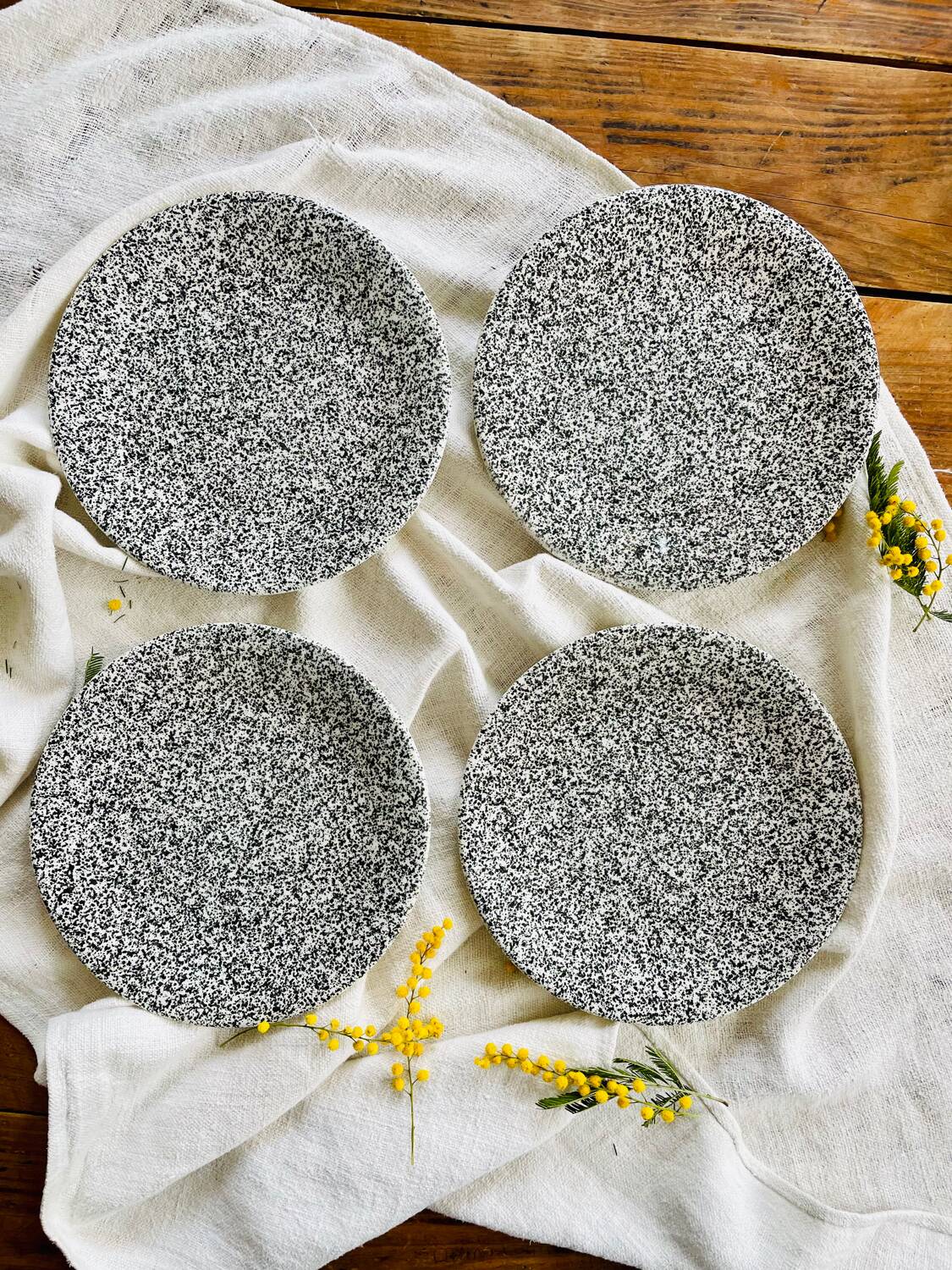 Set of 4 speckled black and white ceramic plates made in Italy